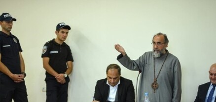 Armenian Archbishop Mikael sentenced to two years in prison, court met with “Shame” chants